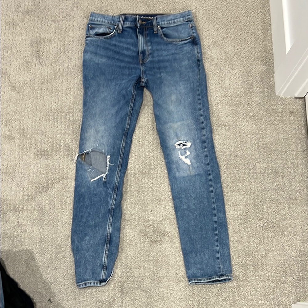 Distressed Blue Jeans